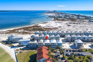 The ultimate in beach living in Gated Waterfront community with Pool in Gulf Breeze, Florida