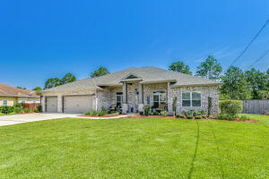 Spacious 4BR plus office, 3 bath, 3 car garage home on large ¾ acre fenced lot has spacious screened porch with fireplace. 