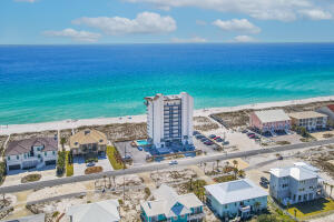 Waterfront Furnished condo on the Gulf of Mexico. Gulf breezes and wonderful views of the emerald waters and white sugar sand beach will welcome you as you relax on your Gulf front balcony