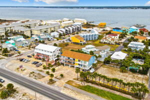 Sleeps 16! Gulf View Towhome (2 combined & updated units). Directly across from walk over to the white sugar soft sands and emerald green waters of the Gulf of Mexico.