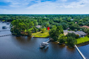 Waterfront 1.28 Acres on East Bay with 206 feet of Waterfront, Dock and Seawall. Location! Location!